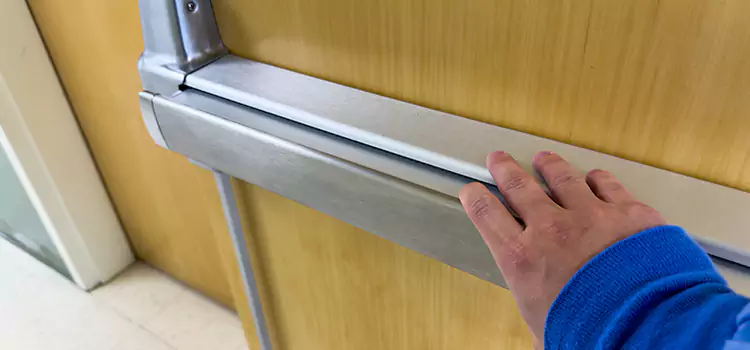 Installing a Push Bar on a Door Banning